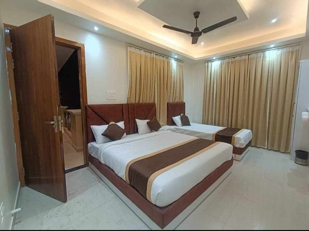 3 Bed Non-AC at Shri Gajanan Maharaj Sansthan — Comfortable room with natural ventilation